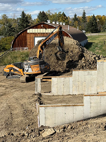 Image 2 - acreage development, foundating, 2 Sons Excavating serving Calgary and surrounding areas.