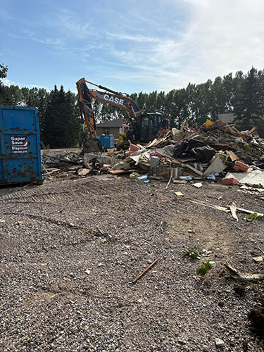 Image 2 - Demolition services from 2 Sons Excavating, serving Calgary and up to a 100 km radius of the City of Calgary.