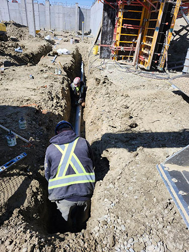 Image 1 - 2 Sons Excavating, mechanical trenching, commercial.
