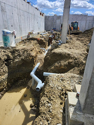 Image 2 - 2 Sons Excavating, mechanical trenching, commercial.